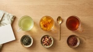 Tea ritual kit for beginners with three tea cups and a gold spoon