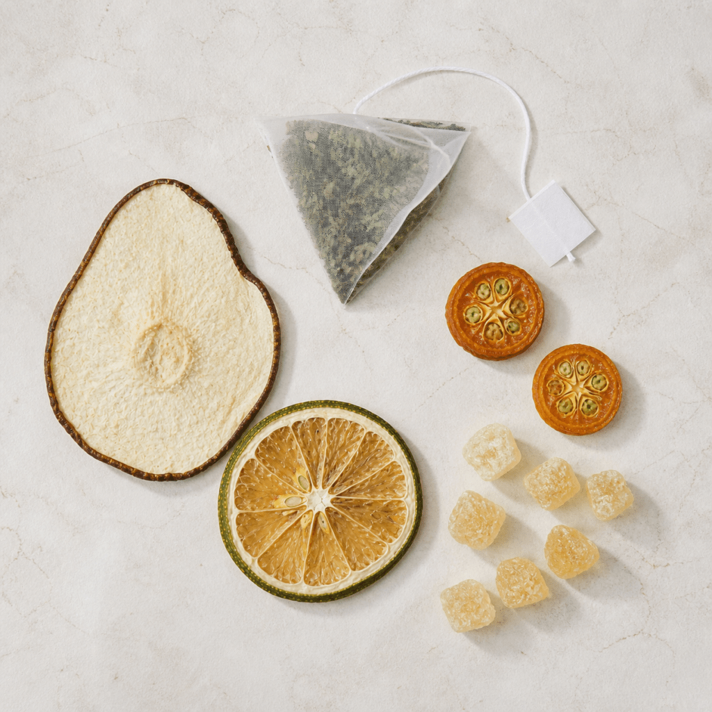 Mint Lime Tea dry lime, pear, kumquat, pale amber rock sugar and one triangular mint tea bag