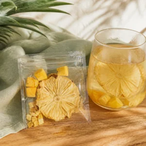 Pineapple mango fruit tea visual featuring pineapple, mango and tropical golden tones