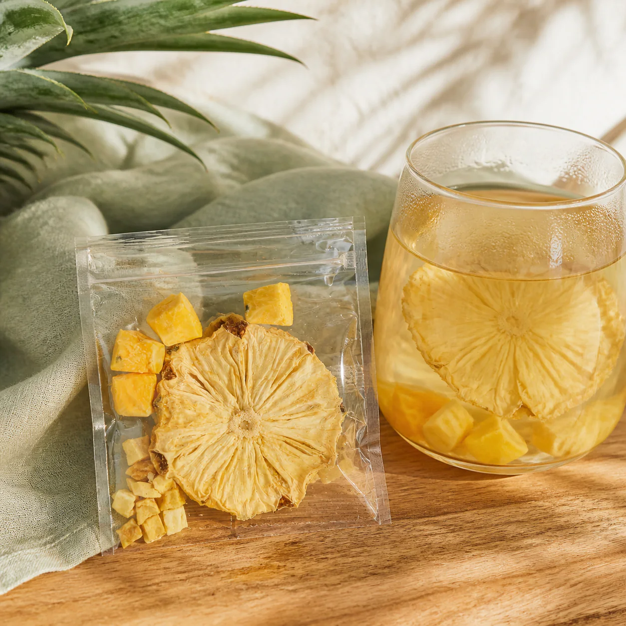 Pineapple mango fruit tea visual featuring pineapple, mango and tropical golden tones